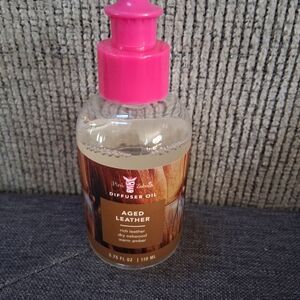 Pink Zebra Aged Leather Diffuser Oil with Vibrant Pink Cap